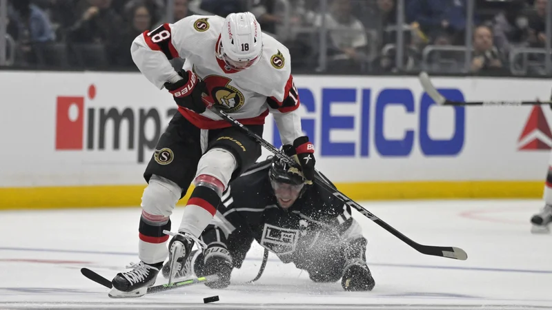 Fotografija: Anže Kopitar (11) in Tim Stutzle (18). FOTO: Jayne Kamin-oncea/USA Today Sports