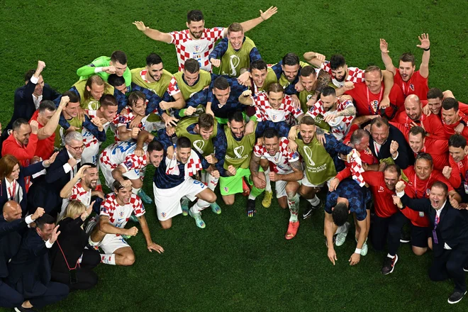 Veseli Hrvati so se zavedali, da so preskočili visoko oviro. FOTO: Manan Vatsyayana /AFP
