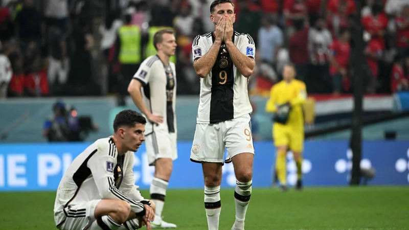 Fotografija: Nemci, svetovni prvaki iz leta 2014, so končali z nastopi na mundialu v Katarju. FOTO: Ina Fassbender/AFP
