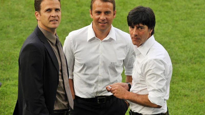 Fotografija: Oliver Bierhoff (levo) s Hansijem Flickom in Joachimom Löwom pred polfinalno tekmo eura 2008 v Baslu. FOTO: John Macdougall/AFP