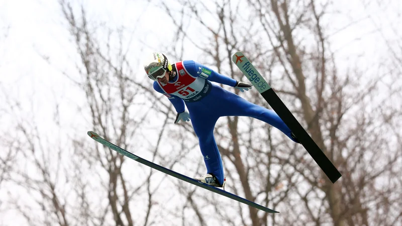 Fotografija: Timi Zajc je bil danes med najdaljšimi v Titisee-Neustadtu. FOTO: Kacper Pempel/Reuters