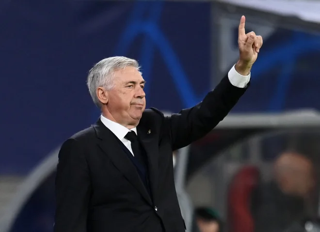 Carlo Ancelotti je enostavno pojasnil vlogo argentinskega selektorja pri šampionski zvezdici. FOTO: Annegret Hilse/Reuters
