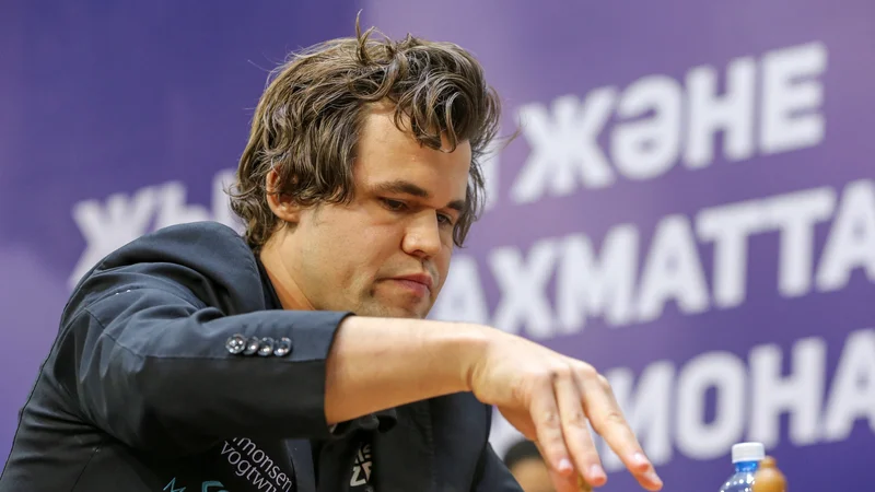 Fotografija: Magnus Carlsen, ki ne skriva, da je velik ljubitelj in podpornik turnirjev s krajšimi časovnimi kontrolami. FOTO: Pavel Mikheyev/Reuters