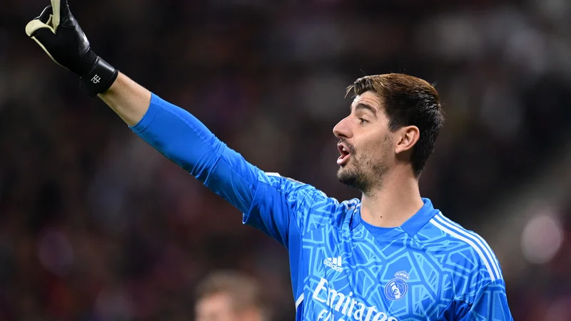 Fotografija: Thibaut Courtois je bil najboljši vratar v letu 2022. FOTO: Annegret Hilse/Reuters