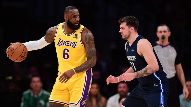 Fotografija: Luka Dončić nikoli ni skrival, da se kljub slabšim telesnim sposobnostim zgleduje po LeBronu Jamesu. FOTO: Gary A. Vasquez/USA Today Sports