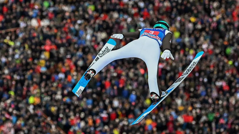 Anže Lanišek bo tudi v Zakopanah močno slovensko orožje. FOTO: Christof Stache/AFP
