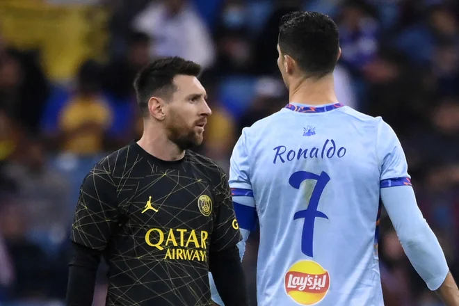 Lionel Messi in Cristiano Ronaldo FOTO: Franck Fife/AFP
