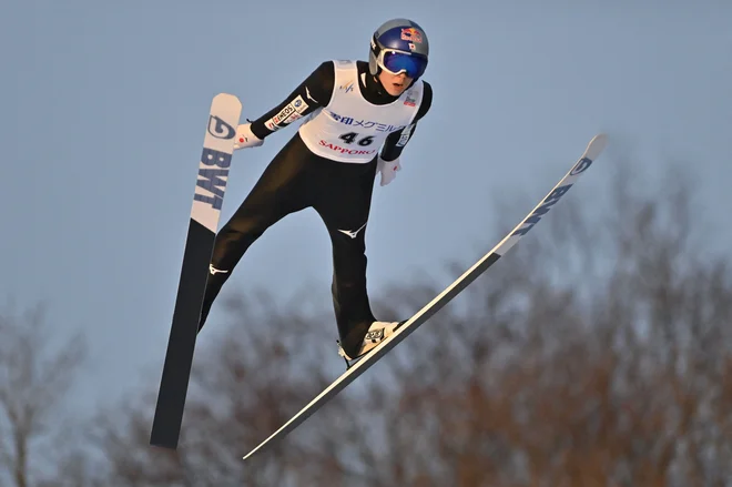 Japonski as Rjoju Kobajaši je takole poletel do zmage v Saporu. FOTO: Kazuhiro Nogi/AFP
