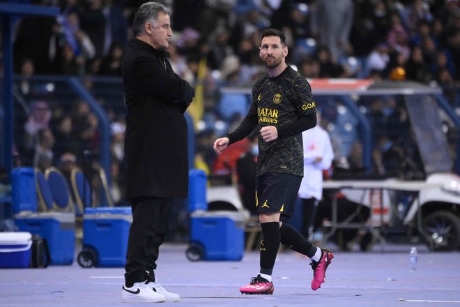 Argentinski napadalec Lionel Messi (desno) in trener PSG Christophe Galtier FOTO: Franck Fife/AFP
