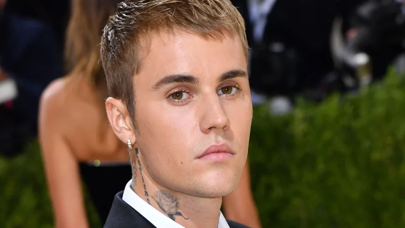 Fotografija: O prodaji pravic za Bieberjeve pesmi se je šušljalo že nekaj tednov. FOTO: Angela Weiss/AFP