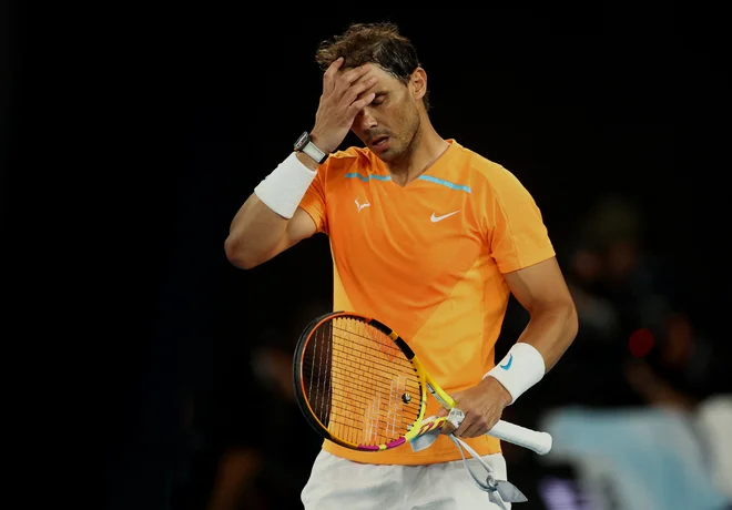 Rafael Nadal je staknil poškodbo med OP Avstralije. FOTO:&nbsp;Carl Recine/Reuters
