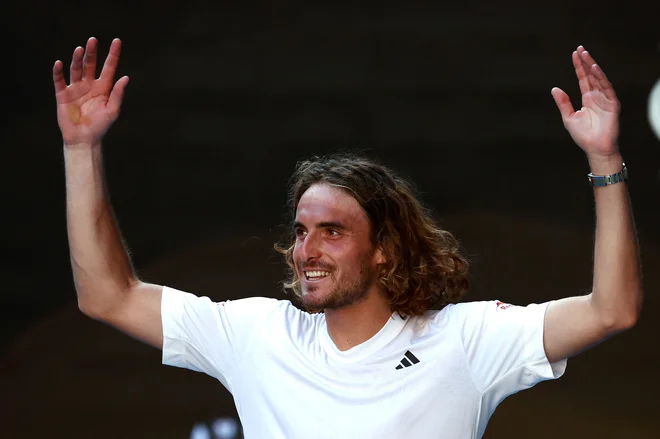 Stefanos Cicipas ni skrival veselja po odmevni uvrstitvi v finale OP Avstralije. FOTO: David Gray/AFP
