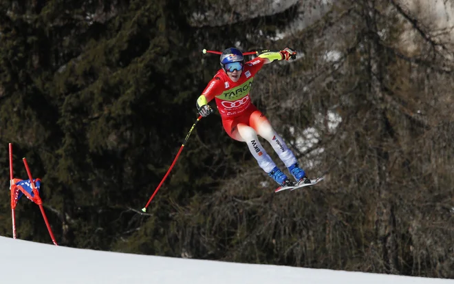 Marco Odermatt je vnovič najhitreje presmučal vratolomni superveleslalom v Cortini d'Ampezzo. FOTO: Alessandro Garofalo/Reuters
