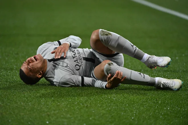 Kylian Mbappe je utrpel poškodbo. FOTO: Sylvain Thomas/AFP

