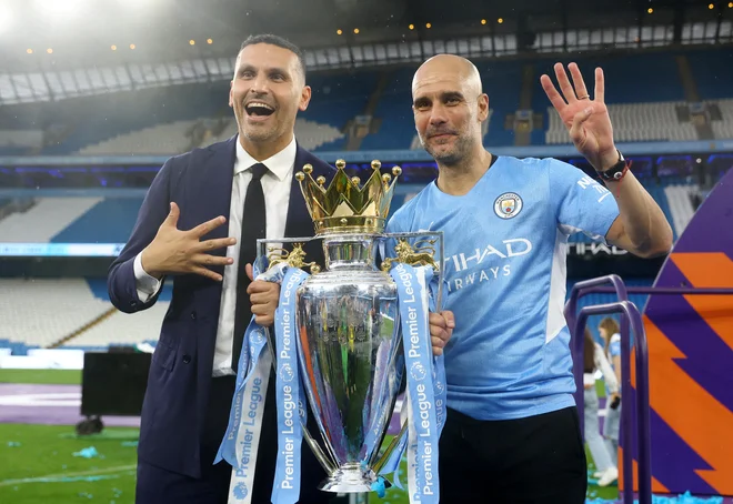 Predsednik Manchester Cityja Khaldoon Al Mubarak in trener Pep Guardiola FOTO: Hannah Mckay/Reuters
