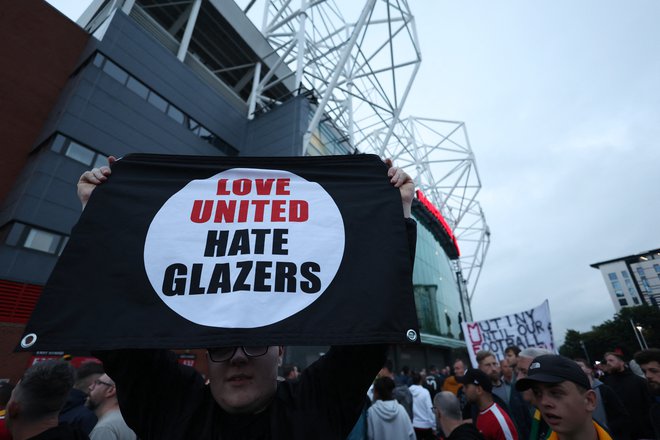 Navijači Manchester Uniteda že vrsto let nasprotujejo družini Glazer, ki lastniško obvladuje klub z Old Trafforda.. FOTO: Carl Recine/Reuters
