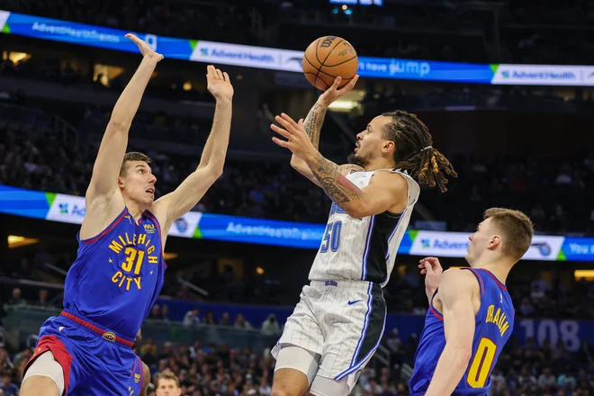 Vlatko Čančar (levo) ni bil razpoložen v Oralndu. FOTO:  Mike Watters/Usa Today Sports
