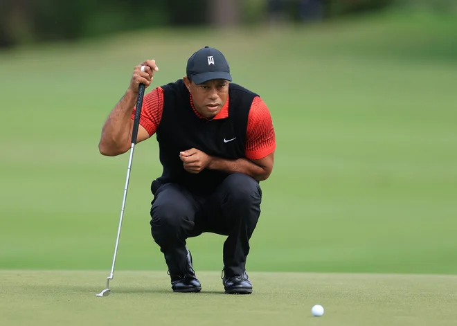 Tiger Woods med decembrskim nastopom v Orlandu. FOTO:&nbsp;David Cannon/AFP

