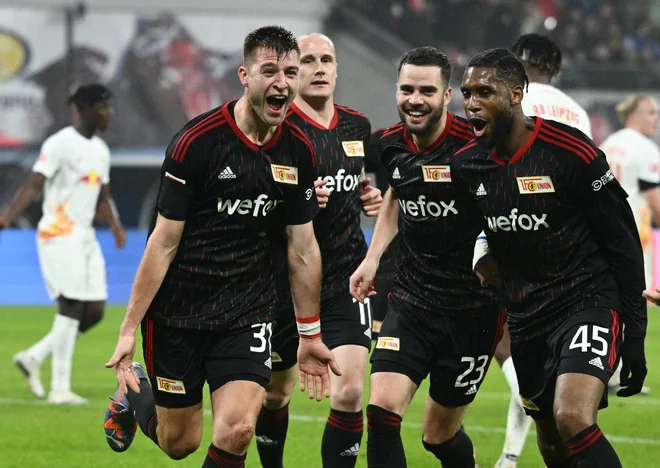 Nogometaši berlinskega Uniona se lahko veselijo, še vedno so glavno presenečenje sezone v bundesligi. FOTO: Annegret Hilse/Reuters
