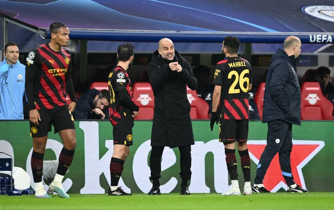 Pep Guardiola s svojimi taktičnimi odločitvami pogosto buri duhove. FOTO: Annegret Hils/Reuters