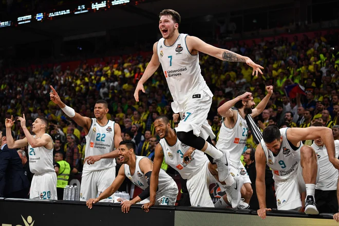 Pred odhodom v ZDA v Dallas je Luka Dončić zablestel v dresu madridskega Reala in z njim osvojil naslov evropskega klubskega prvaka. FOTO: Andrej Isaković/AFP