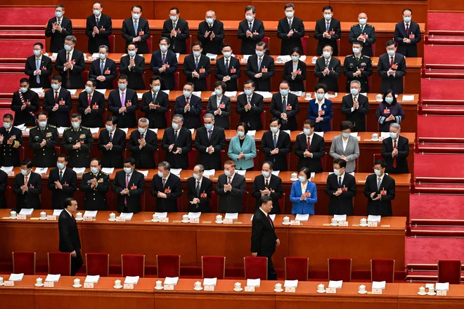 Kongres ljudskih odposlancev najvišjega kitajskega zakonodajnega telesa bo v petek odobril podaljšanje mandata predsedniku republike Xi Jinpingu. FOTO: Noel Celis/AFP
