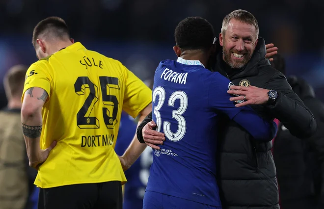 Chelseajev trener Graham Potter in Wesley Fofana sta si po prigarani zmagi planila v objem, medtem ko Niklas Süle (levo) ni skrival razočaranja. FOTO: Adrian Dennis(AFP
