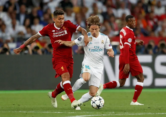 Zgodovina tekem med Realom in Liverpoolom je ponudila že marsikaj. Moštvi bosta naslednji teden igrali povratno tekmo osmine finala lige prvakov.&nbsp;FOTO:&nbsp;Andrew Boyers/Reuters
