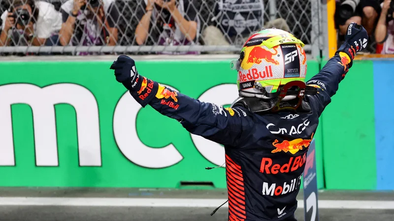 Sergio Perez se je veselil zmage v Savdski Arabiji. FOTO: Giuseppe Cacace/AFP
