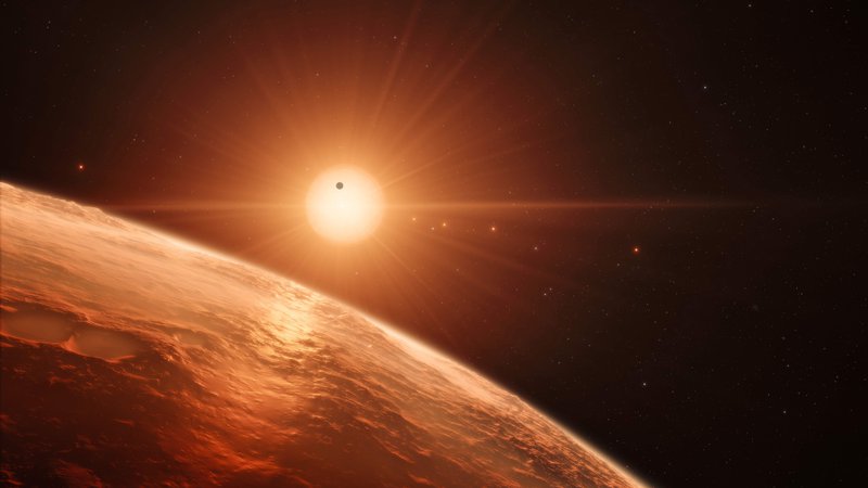 Fotografija: Umetniška upodobitev enega izmed planetov v sistemu Trappist 1. FOTO: ESO/M. Kornmesser/AFP

