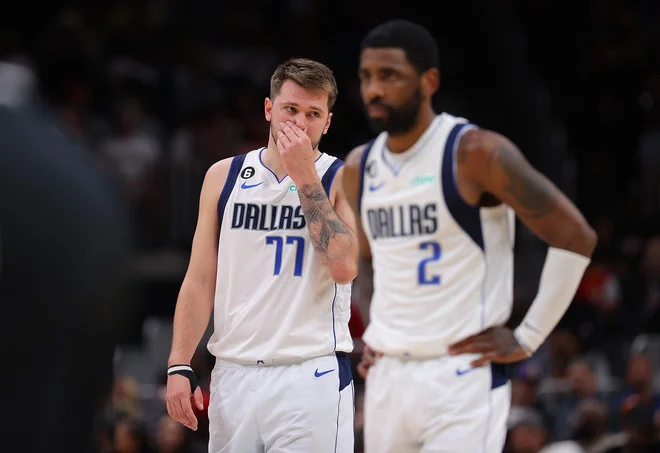 Luka Dončić in Kyrie Irving. FOTO: Kevin C. Cox/Getty Images via AFP