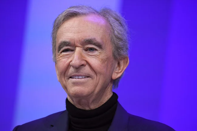 Evropejec Bernard Arnault je na prvem mestu najbogatejših ljudi. FOTO: Eric Piermont/AFP