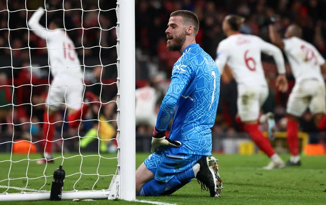 David de Gea ni mogel preprečiti izenačenja Seville. FOTO: Darren Staples/AFP