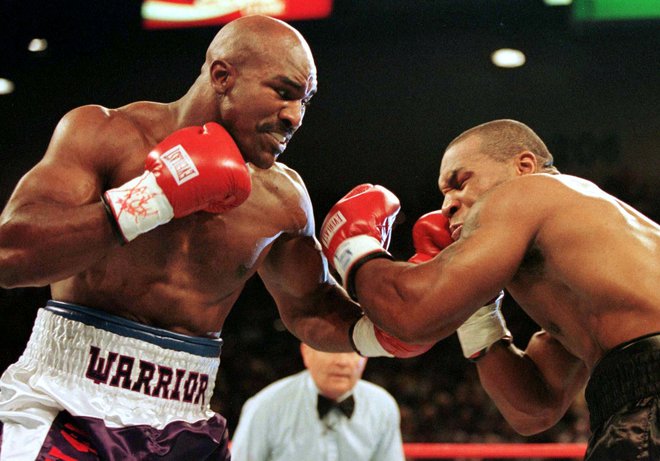 Evander Holyfield je dvakrat premagal Tysona. FOTO: Gary Hershorn/Reuters
