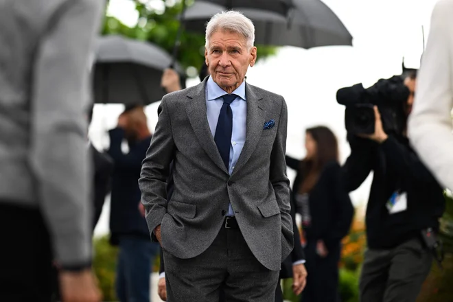 Na letošnjem festivalu v Cannesu se je poslovil od vloge Indiane Jonnesa. FOTO: Patricia De Melo Moreira/AFP