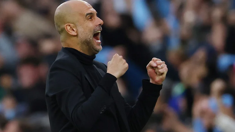 Pep Guardiola na trenerskem stolčku Manchester Cityja zbira lovorike. FOTO: Molly Darlington/Reuters