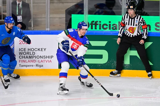 Richard Panik (na sredini) je popeljal Slovake v vodstvo. FOTO: Gints Ivuskans/AFP