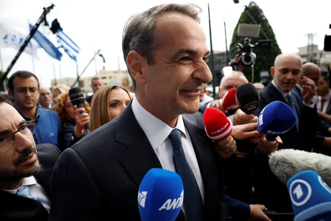 Gršekemu premierju Kiriakosu Micotakisu se obeta še en mandat. FOTO: Louiza Vradi Reuters