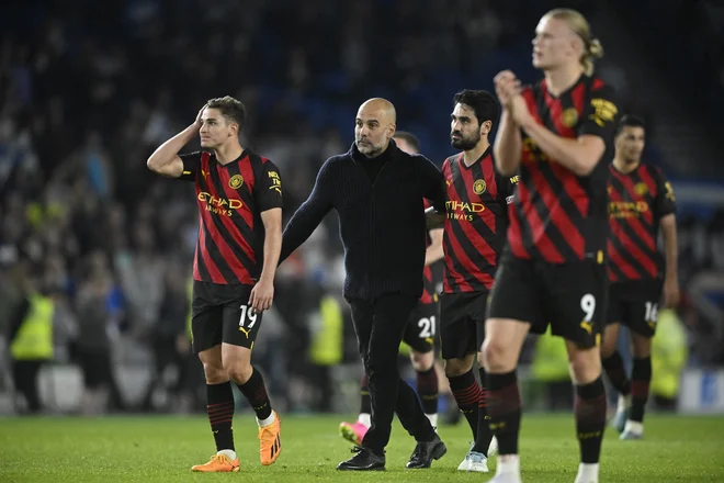 Pep Guardiola je bil ponosen na igralce. FOTO: Toby Melville/ Reuters