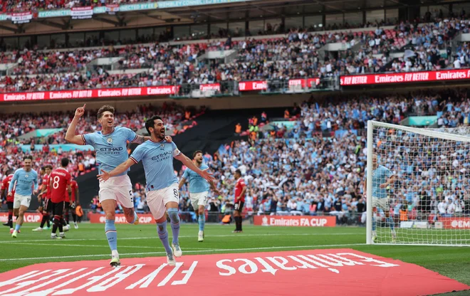 Ilkay Gündogan (8) je bil junak zmage Manchester Cityja. FOTO: Adrian Dennis/AFP