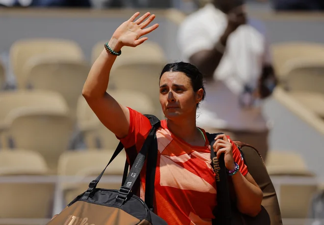Ons Jabeur se je nepričakovano poslovila v četrtfinal. FOTO: Clodagh Kilcoyne/Reuters