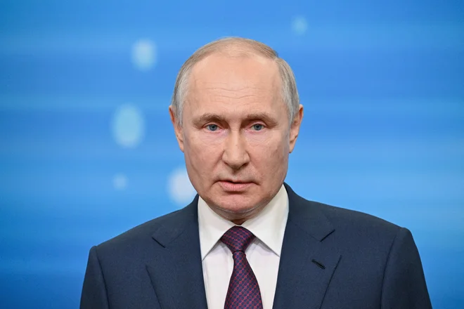 Ruski predsednik Vladimir Putin med nagovorom v Sočiju. FOTO: Host Photo Agency via Reuters