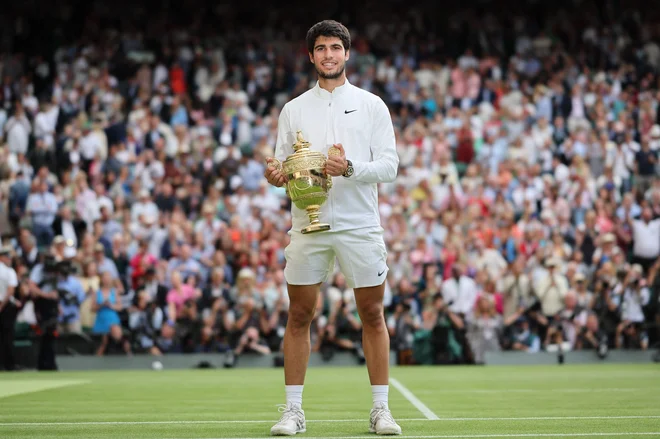 V nedeljo je po lanskem odprtem prvenstvu ZDA drugič osvojil turnir za grand slam. FOTO: Adrian Dennis/AFP