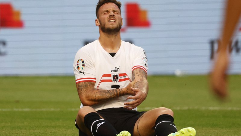 Fotografija: Avstrijcu srbskih korenin Marku Arnautoviću se še ne gre iz Italije, po dveh sezonah pri Bologni bo naslednji dve igral za Inter. FOTO: Yves Herman/Reuters