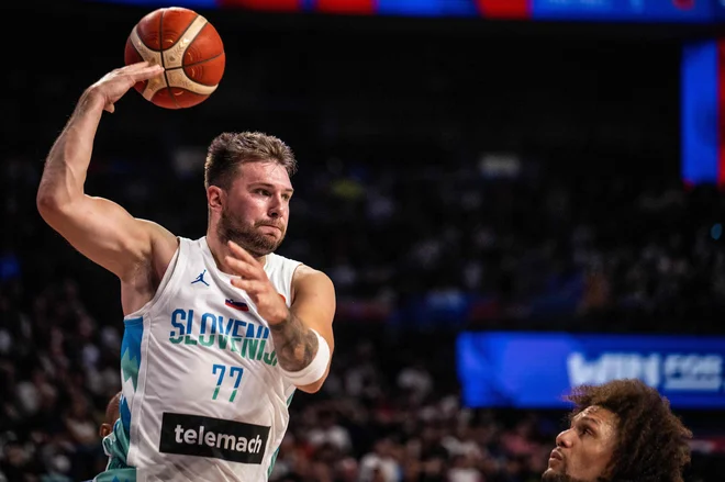 Luka Dončić je spet čaral na igrišču. FOTO: Yuichi Yamazaki/AFP