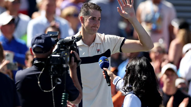 Pri 38 letih se je od vrhunskega tenisa poslovil nekaj let tudi najboljši Američan lestvici ATP John Isner, ki je v teniški karavani tudi rekorder po številu doseženih asov. FOTO: Al Bello Getty/AFP