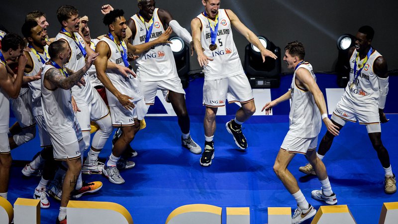 Fotografija: Naslov svetovnih pvakov bo nemški košarki prinesel tudi boljši status znotraj nemške športne družine. FOTO: Sherwin Vardeleon/AFP