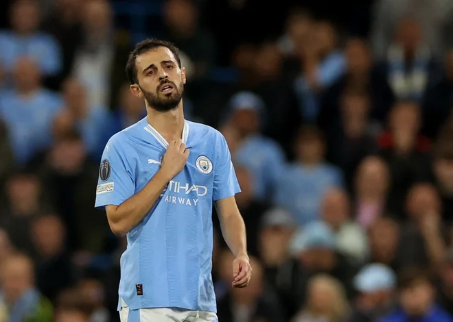 Bernardo Silva se je poškodoval v prvem polčasu. FOTO: Phil Noble/Reuters