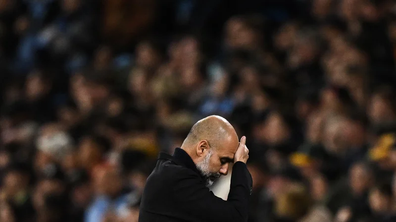 Fotografija: Pep Guardiola ima vse več skrbi. FOTO: Oli Scarff/AFP