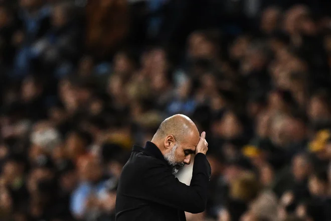 Pep Guardiola ima vse več skrbi. FOTO: Oli Scarff/AFP